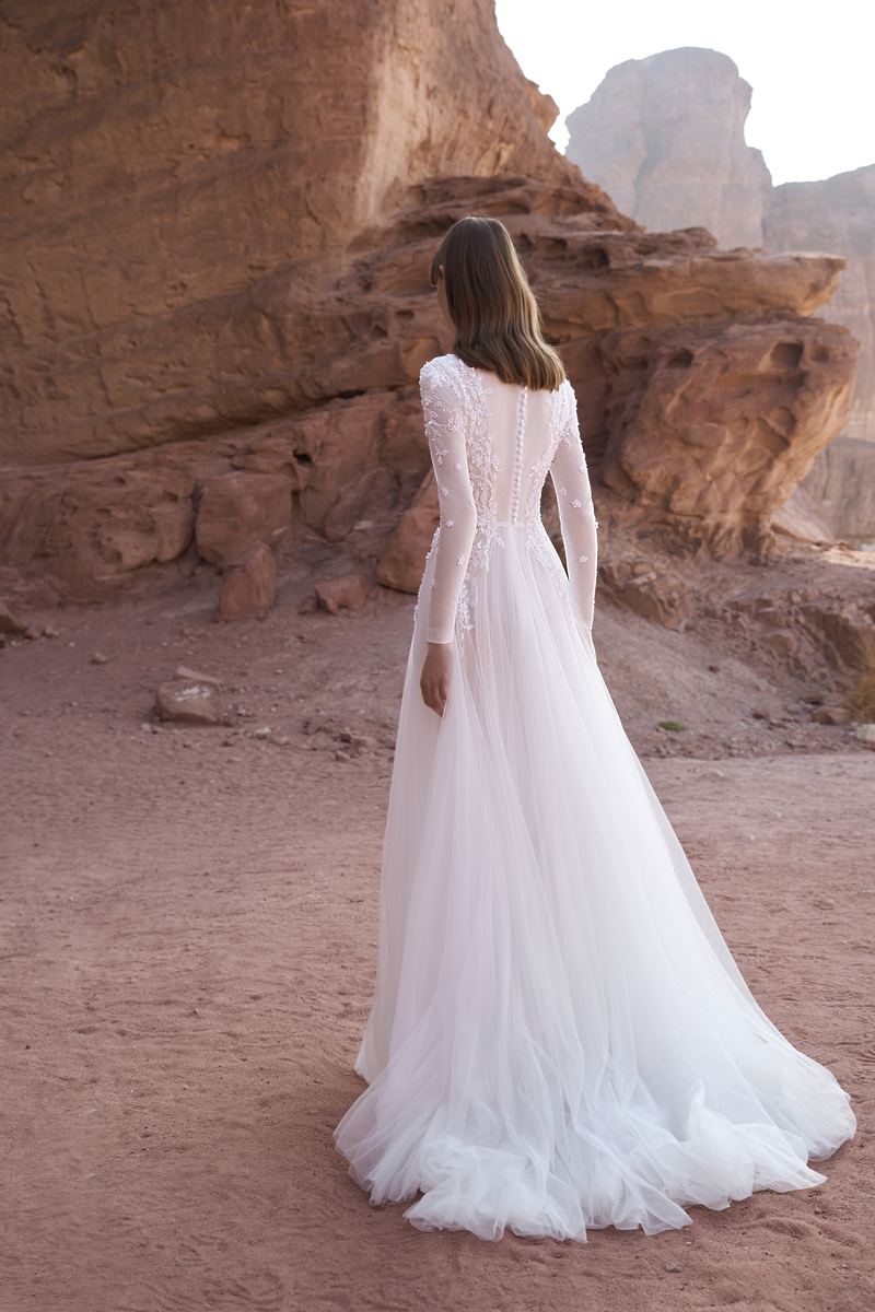 Canyon Whisper — buttoned lace back against sandstone cliffs