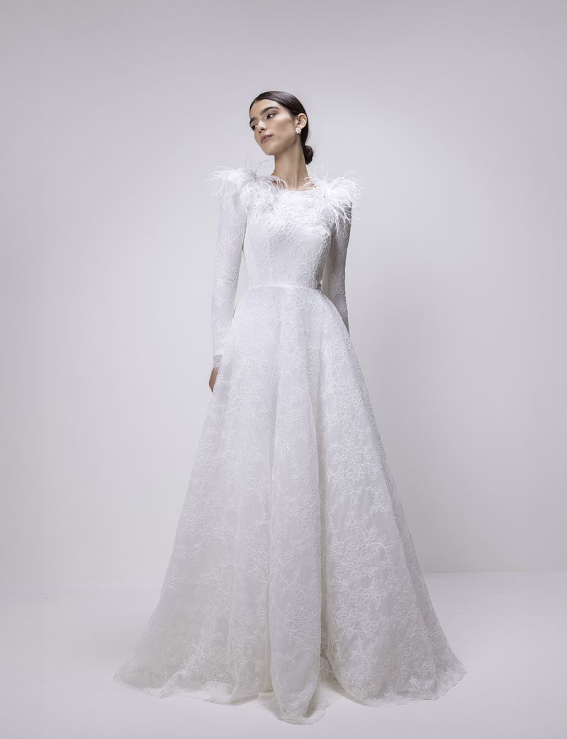 The Plume — lace gown with feathered shoulders